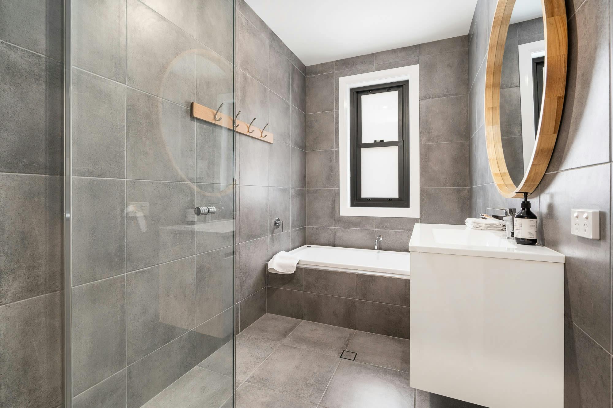 Bathroom with bath, shower and toilet separate