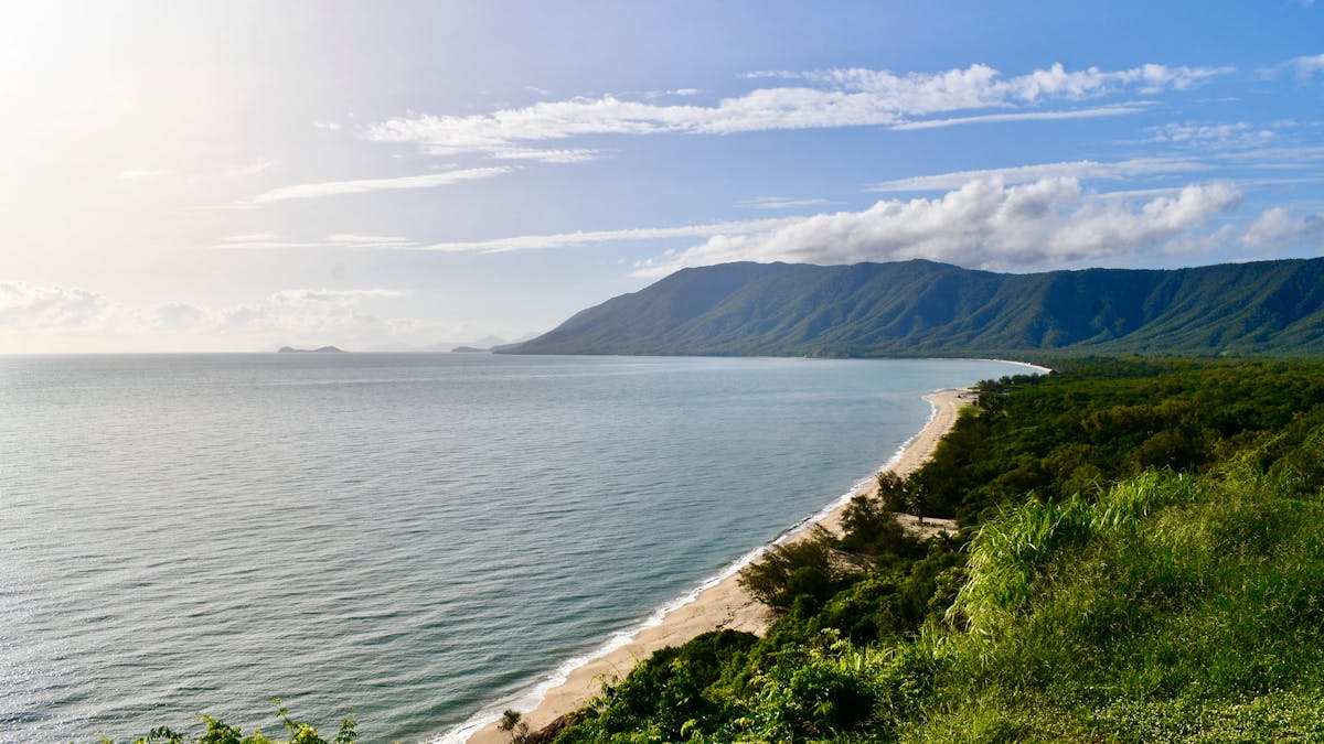 Wide shot of Rex Lookout with Tropical North Queensland Beachline, Mountains and Rainforest