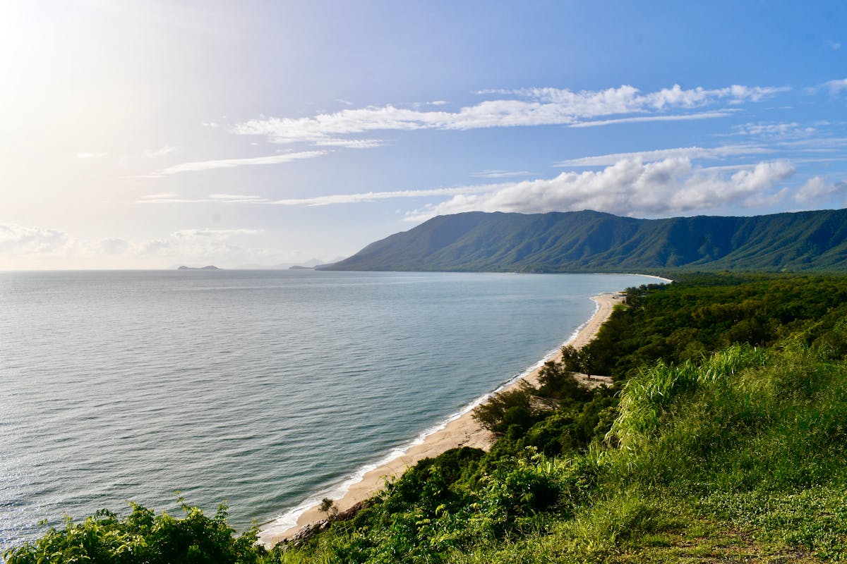 Wide shot of Rex Lookout with Tropical North Queensland Beachline, Mountains and Rainforest