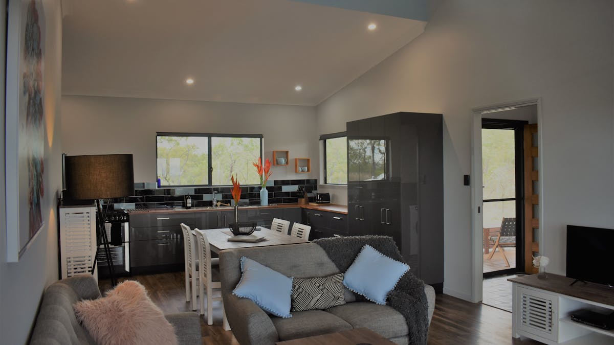 Spacious living/dining area with a large fully equipped kitchen, plus views!