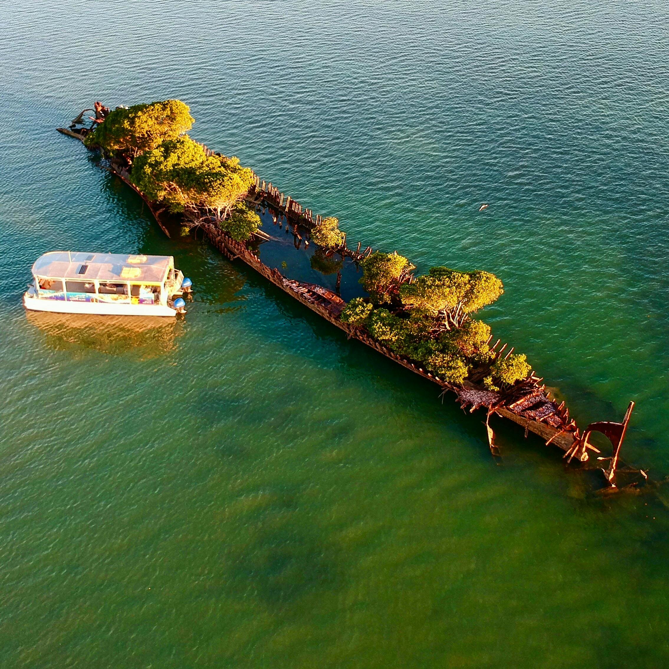 Aquascene boat at sunset showing guests the shipwreck of the SS City of Adelaide