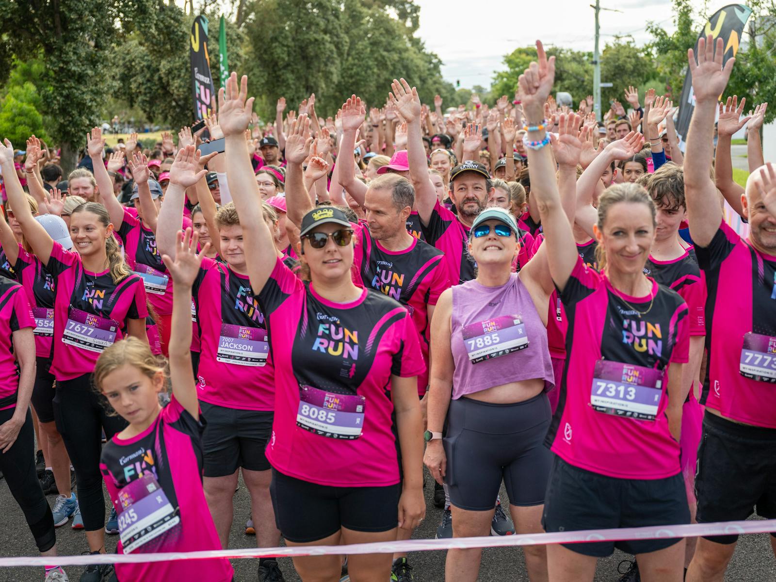 Participants with their hands up