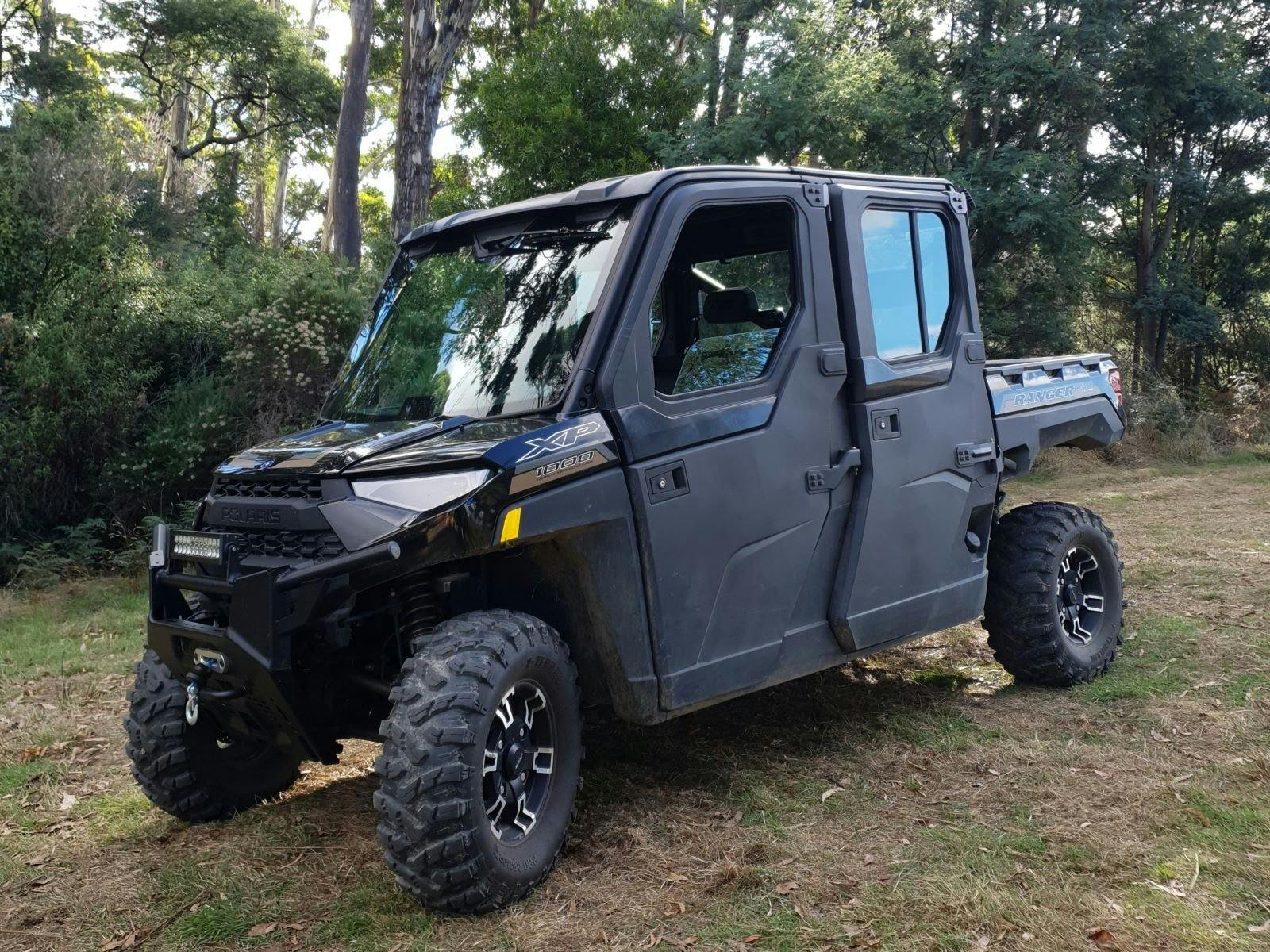 Black Polaris 6 seater all terrain vehicle