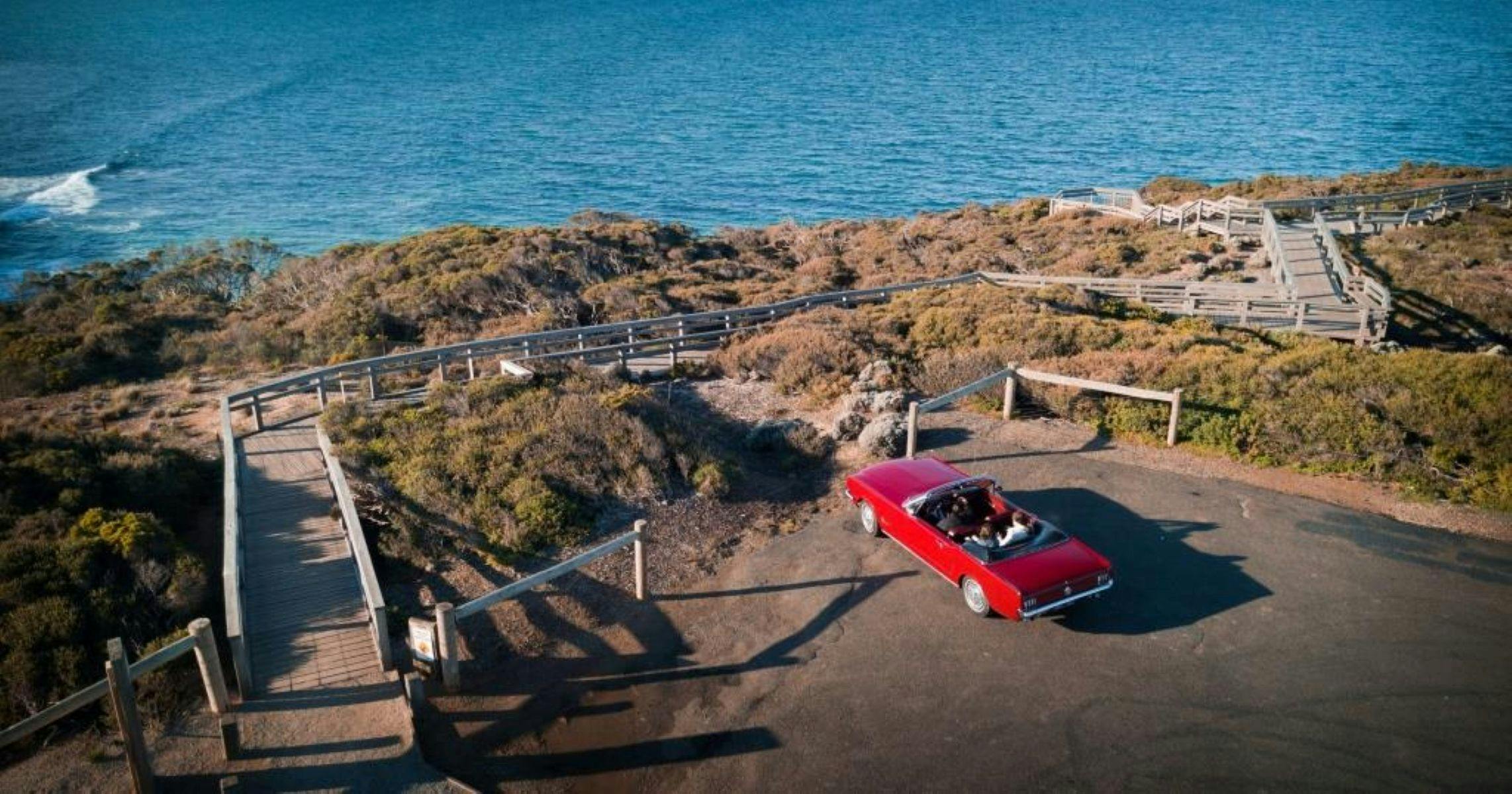 Coast view from Point Addis in a Vintage Mustang convertible with chaffeur driver