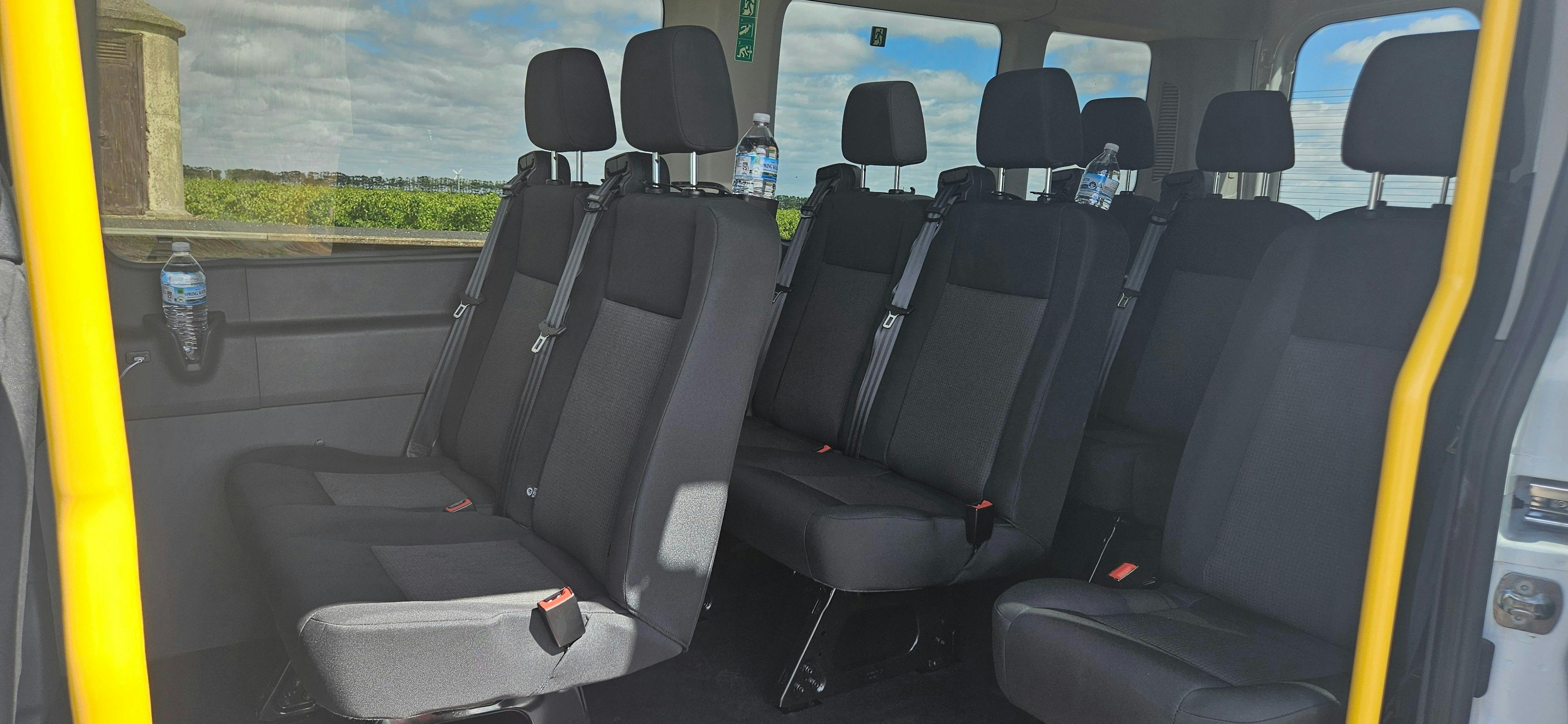 Passenger seating inside Ford Transit touring vehicle used for private wine tours