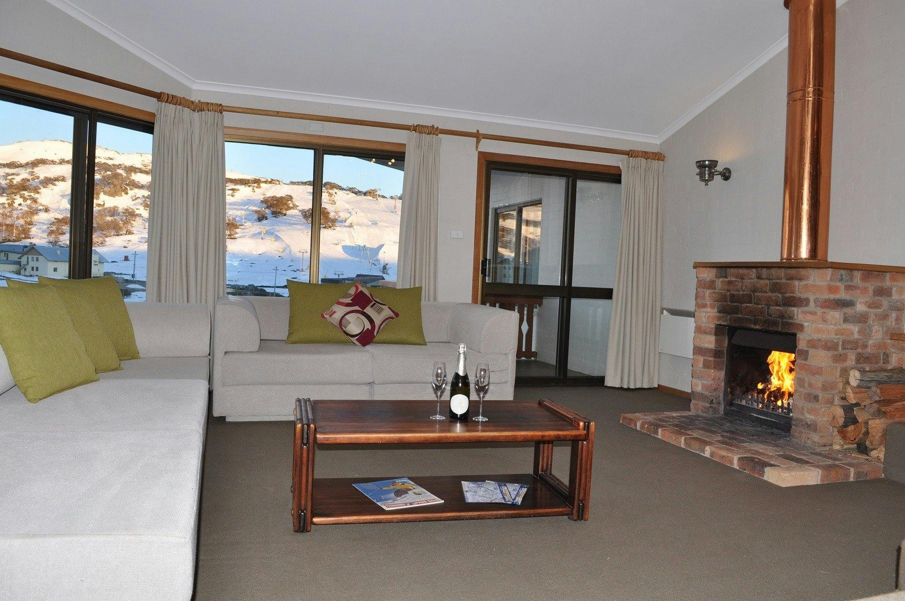 Salzburg Apartments Lounge with Open Fireplace