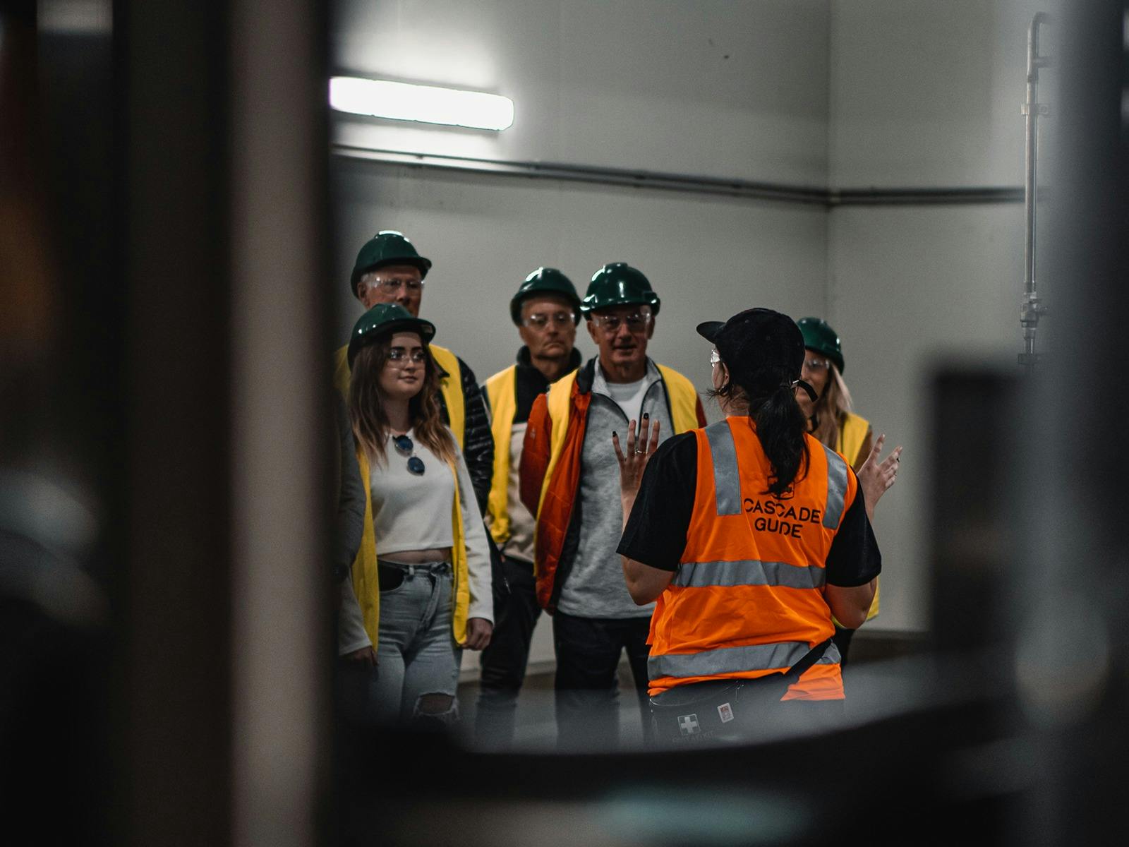 Tour group inside brewery cellar