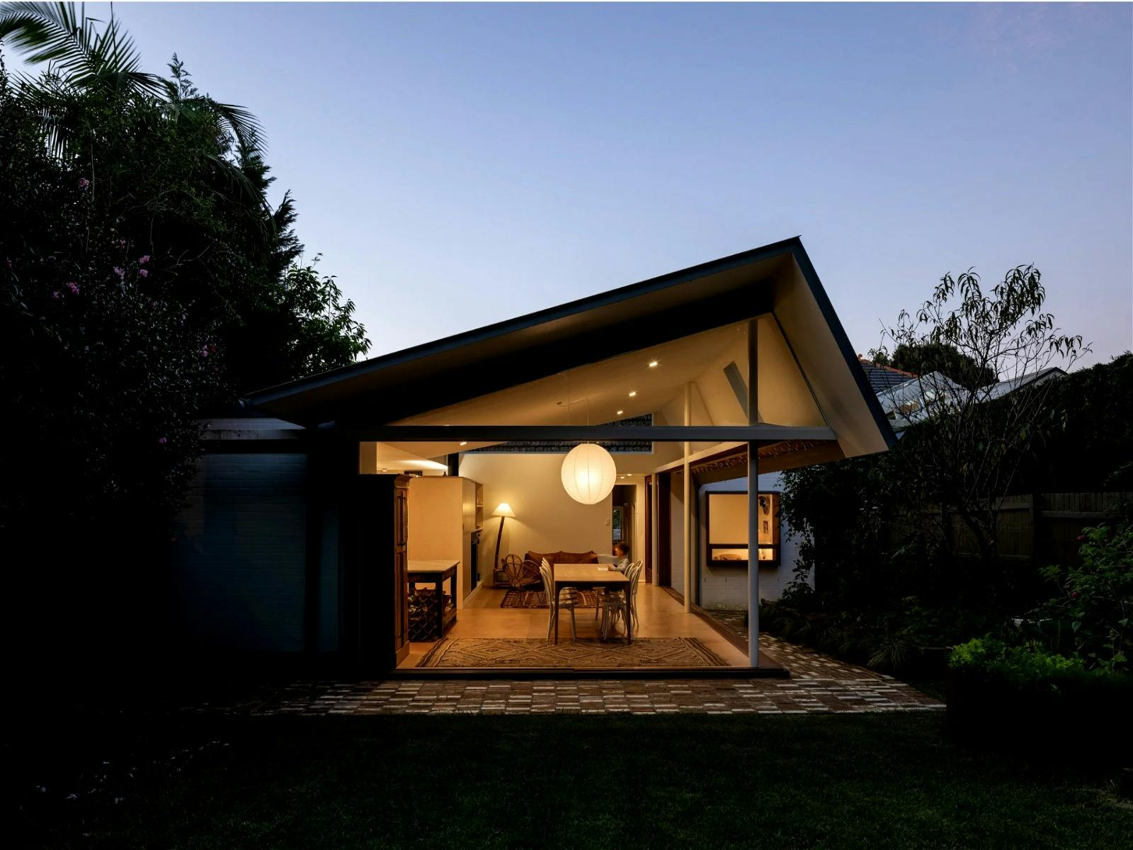 The back of the house is all about the kitchen, living, dining, and of course the garden