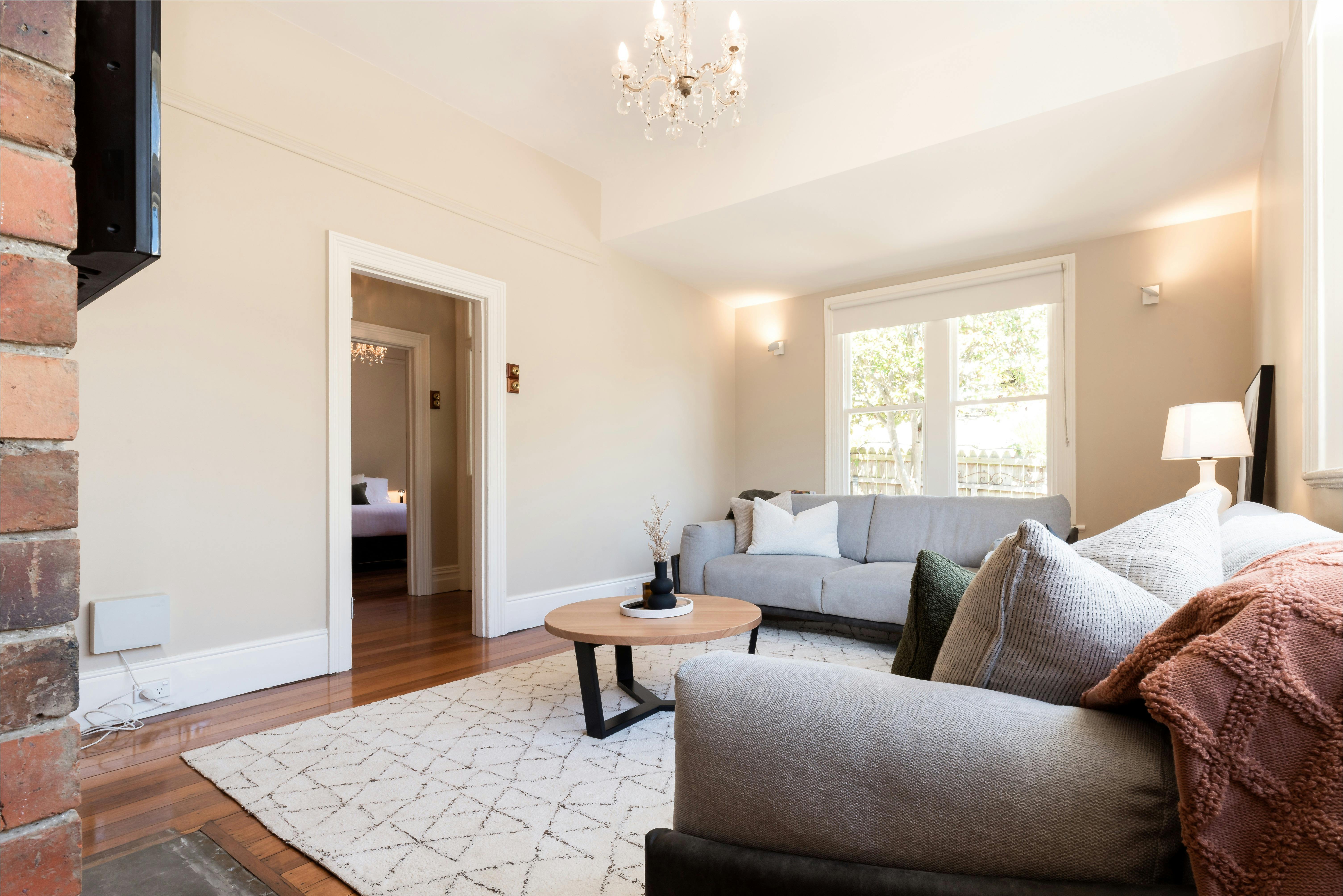 Lounge room with television at Gorgeous on Galvin holiday home