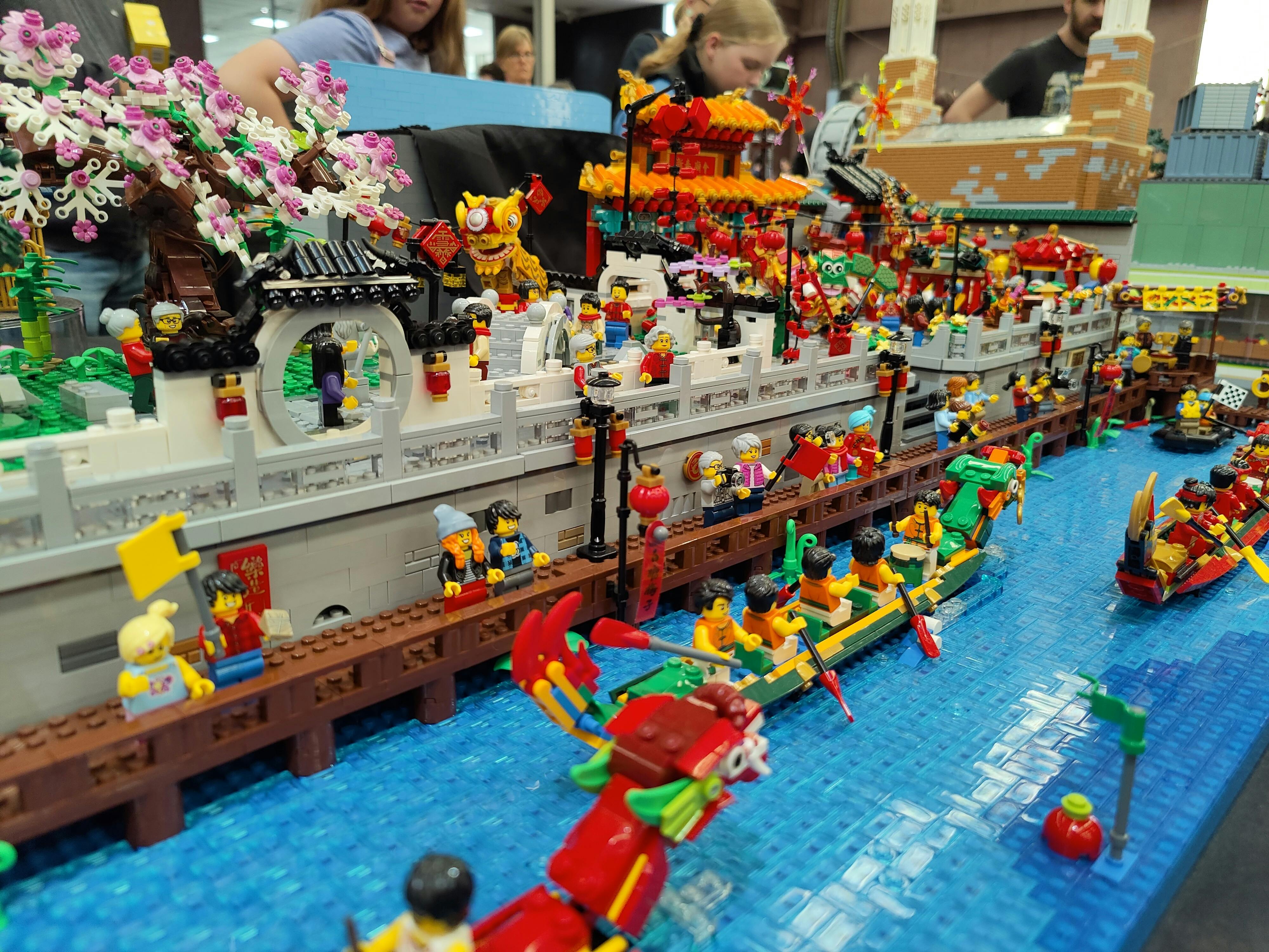 LEGO® display featuring a Dragon Boat race, festival and market.