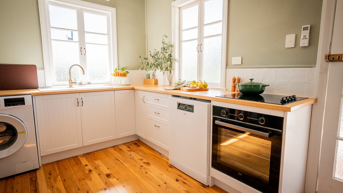 Full kitchen includes oven, sink, dishwasher, fridge and other appliances
