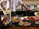 Cheese board and canapes sit on bar for class participants to enjoy
