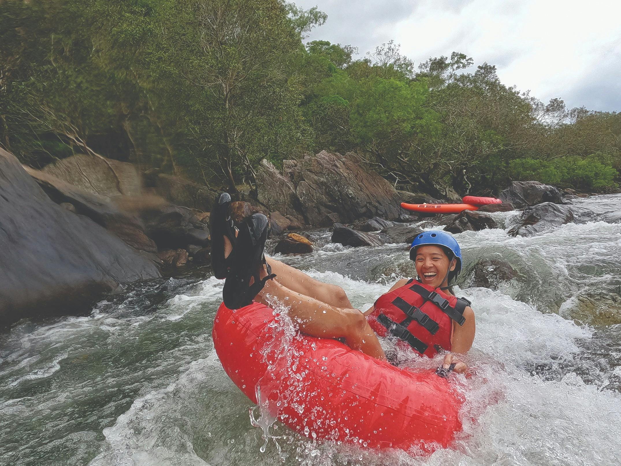 Tubing through the rainforest in Tropical North Queensland on the Little Mulgrave River Near Cairns