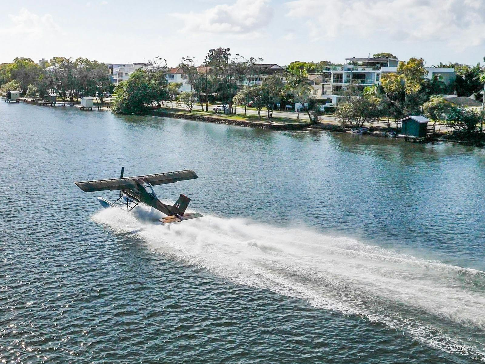 Wilga 80 seaplane takes off from Maroochy River