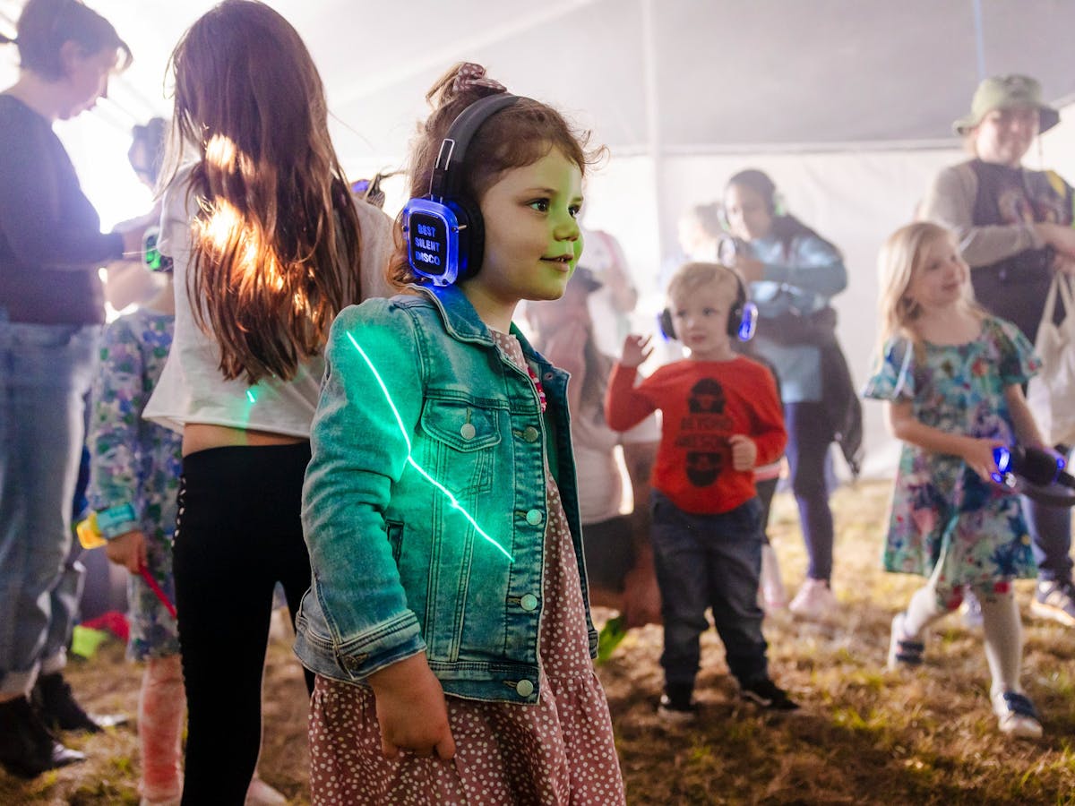 Silent disco child wearing headphones