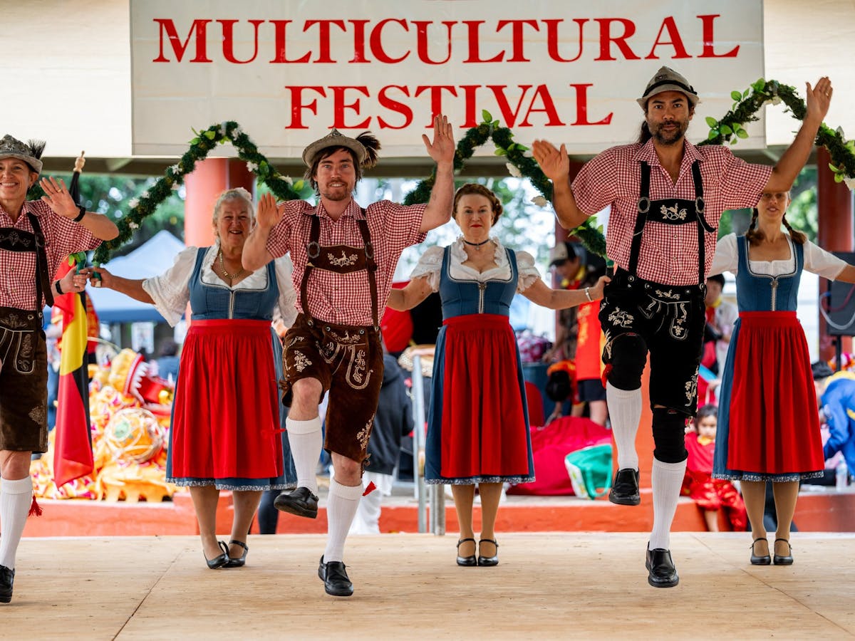 Men and women perform a traditional swiss/german dance at the Mareeba Multicultural Festival.