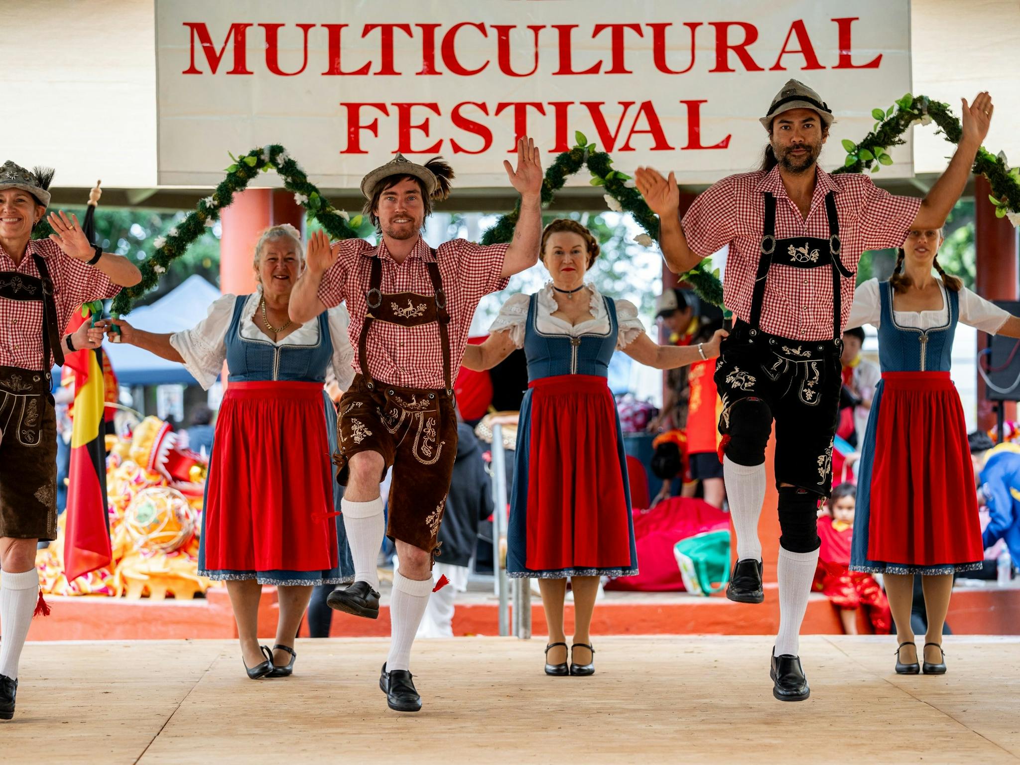 Men and women perform a traditional swiss/german dance at the Mareeba Multicultural Festival. Men and women perform a traditional swiss/german dance at the Mareeba Multicultural Festival.
