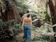 A man and woman walking on a walking trail to Keppel Falls