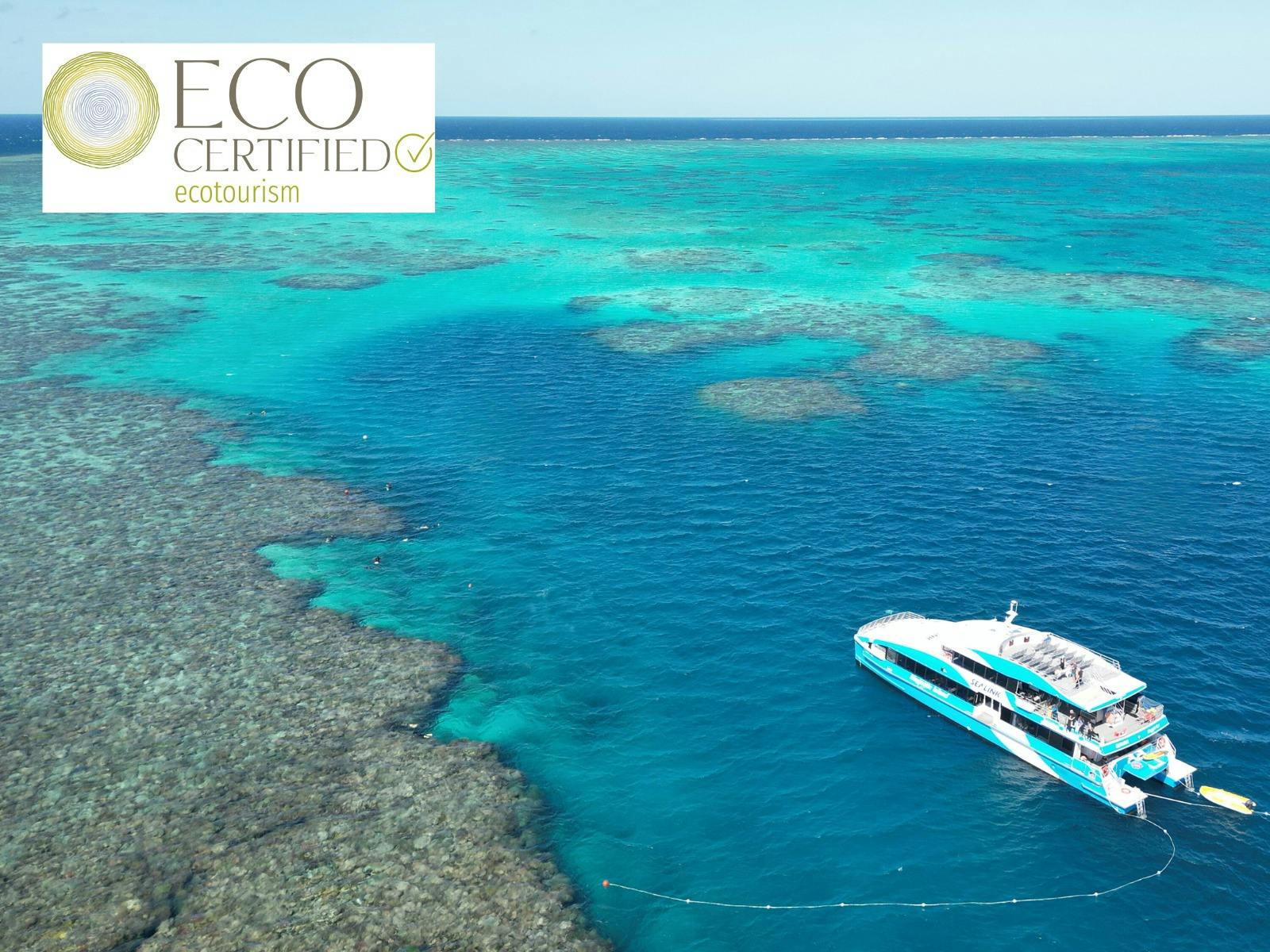 An aerial view of SeaLink's vessel Maggie Cat surrounded by John Brewer Reef