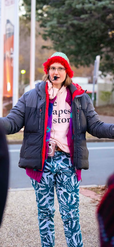 Local guide in Canberra walking with group