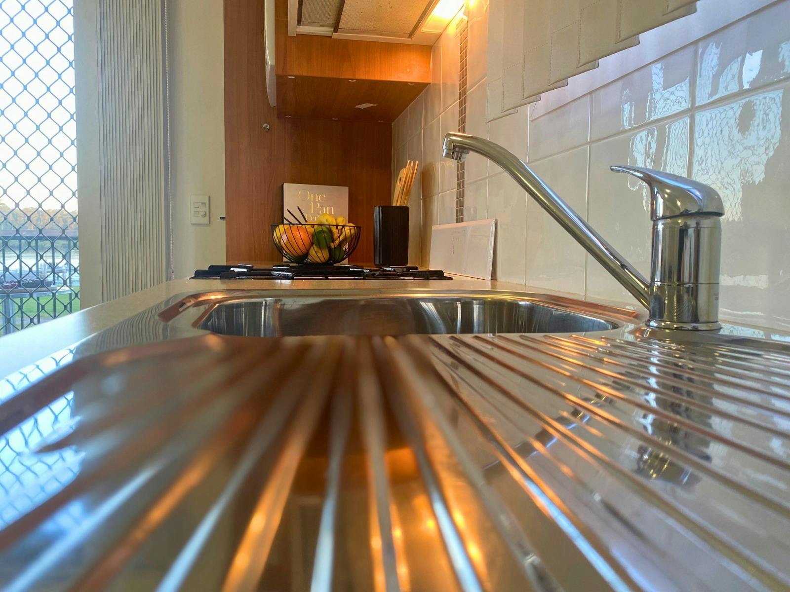 Cook up a storm in our kitchen with views of the river, ensuring a pleasant cooking experience.