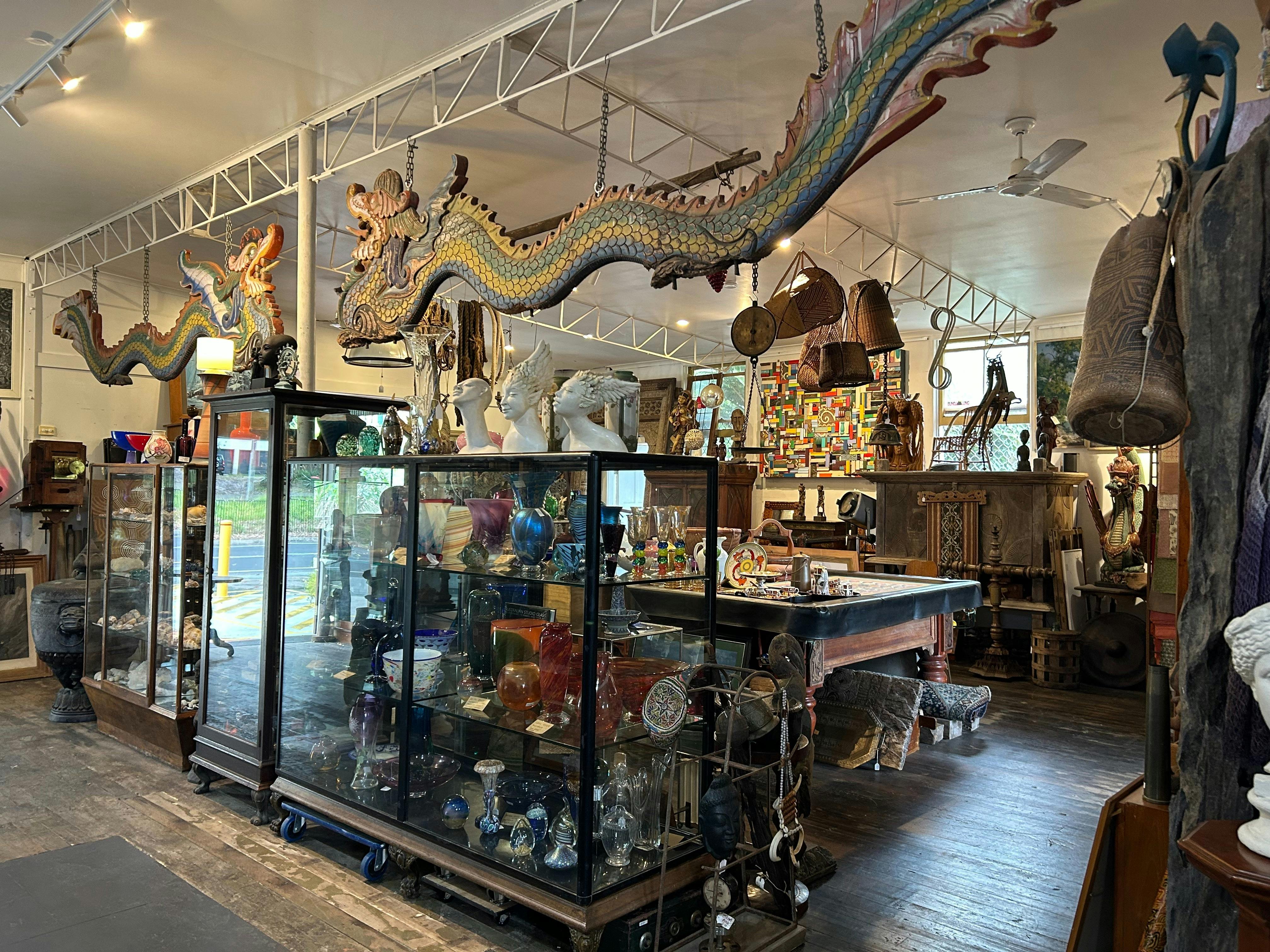 Display cabinets with suspended dragons