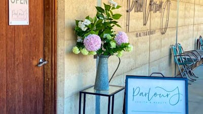 This pbhto of is the entry of parlour J with a sign saying now open.