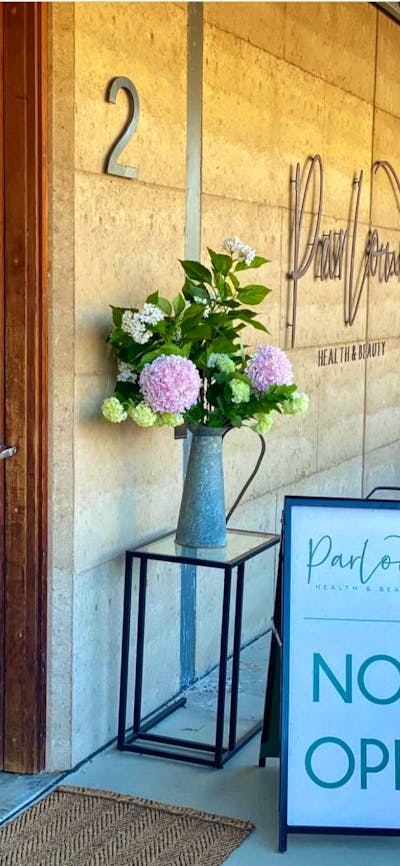 This pbhto of is the entry of parlour J with a sign saying now open.