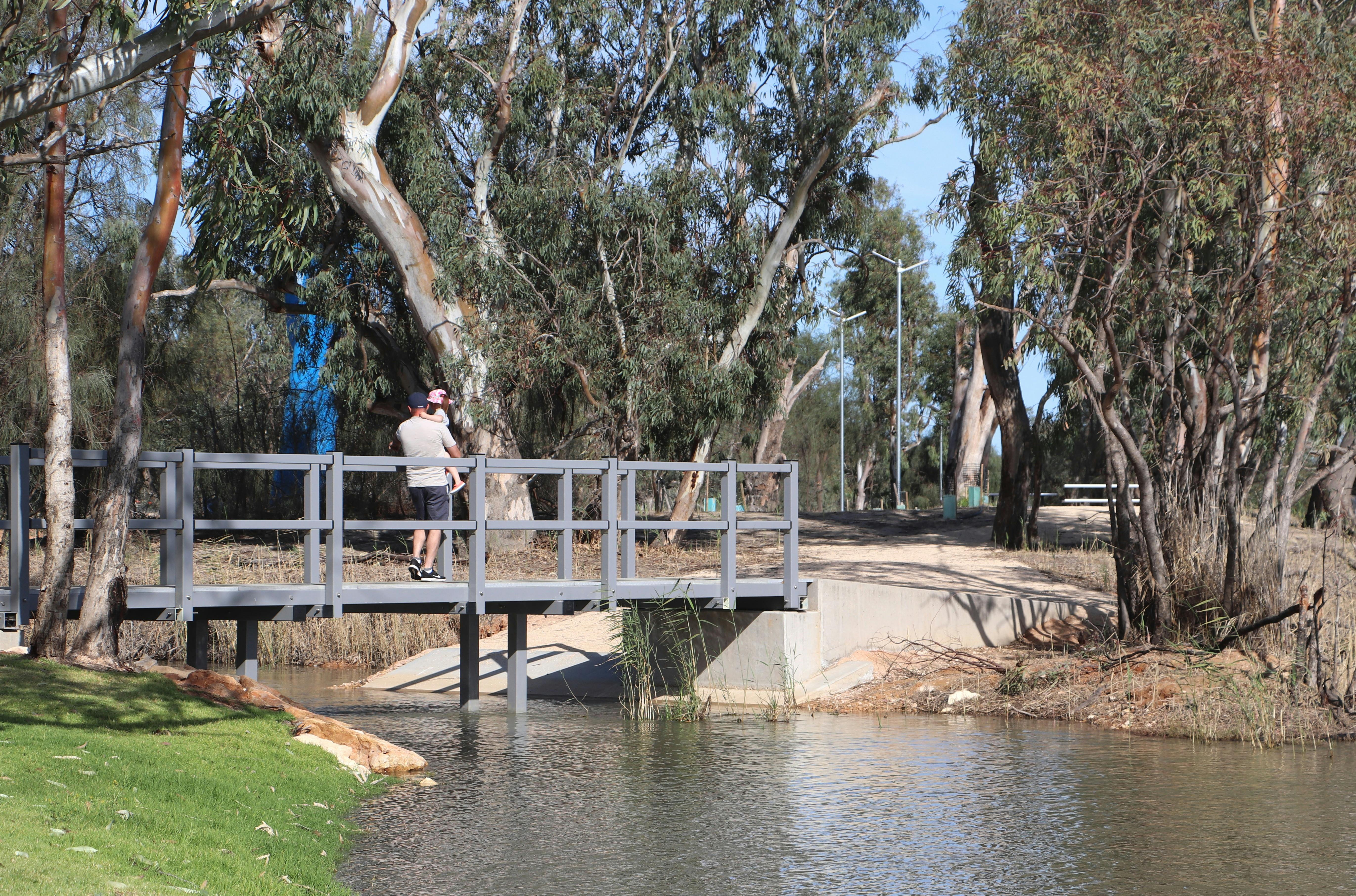 People can access the island via a footbridge.