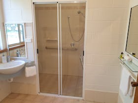 Shower, vanity and toilet
