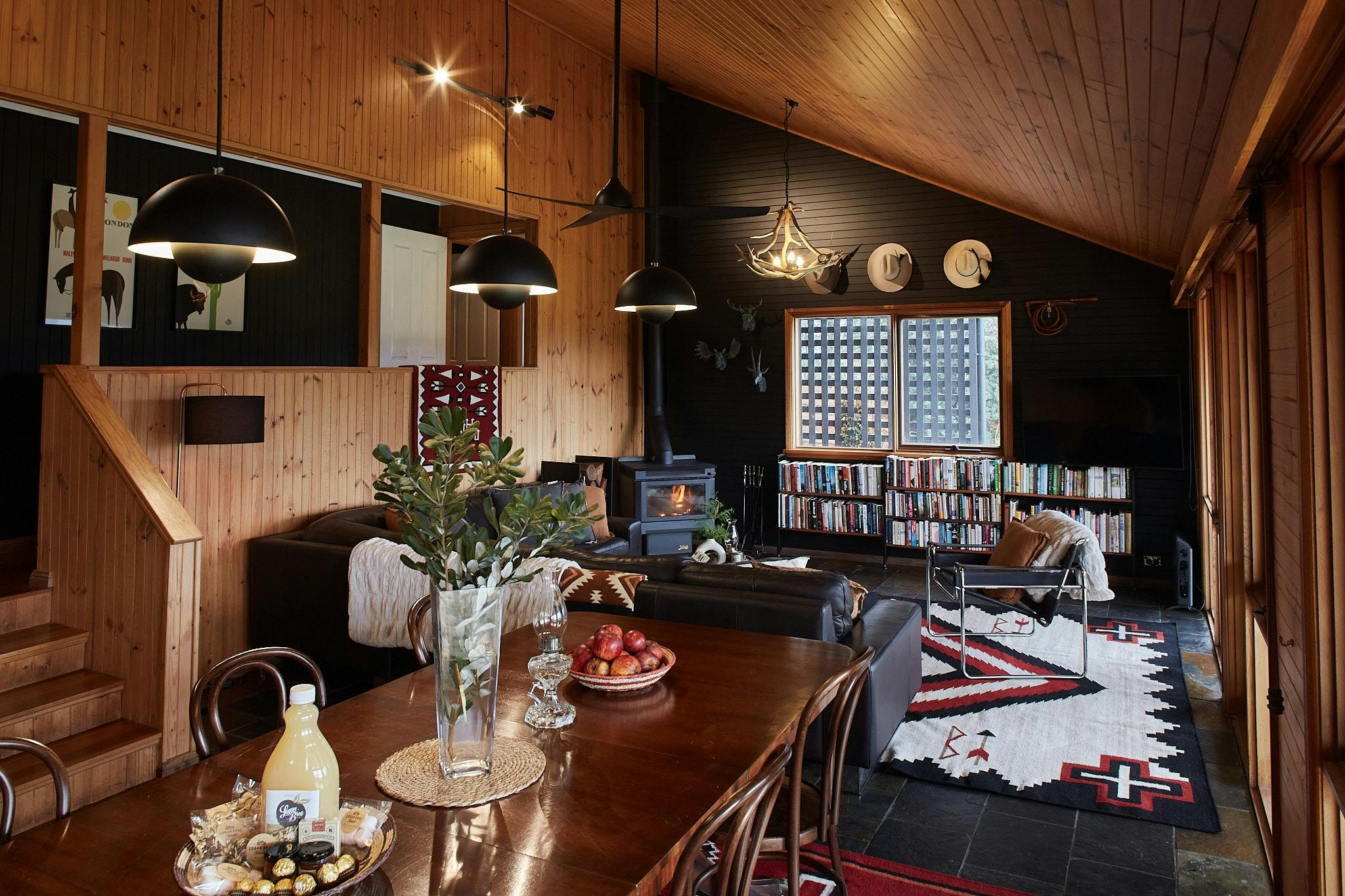 Living area at the Lodge with indoor wood burning fireplace