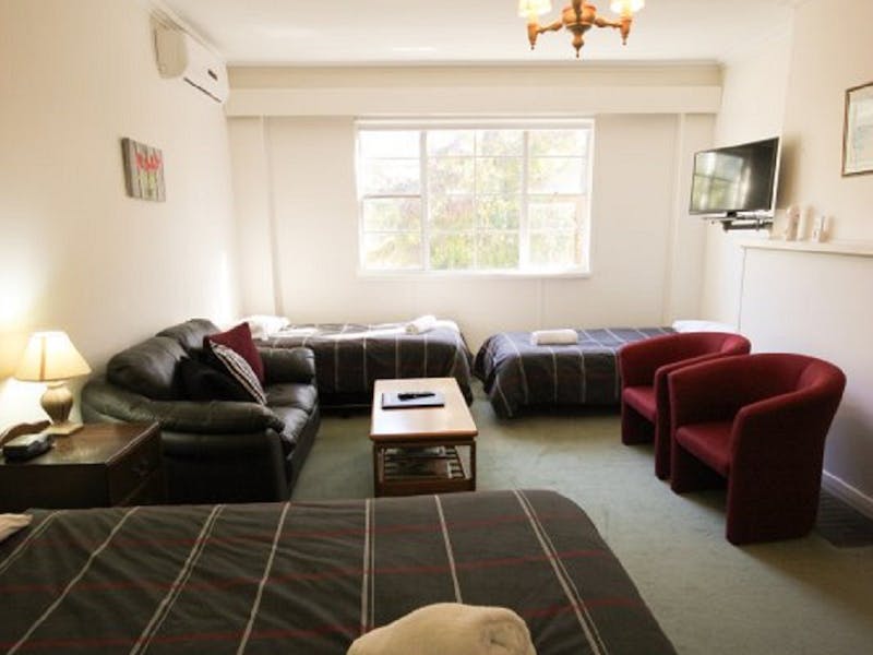 One Bedroom with QS bed and 2 Singles plus a lounge and tub chairs