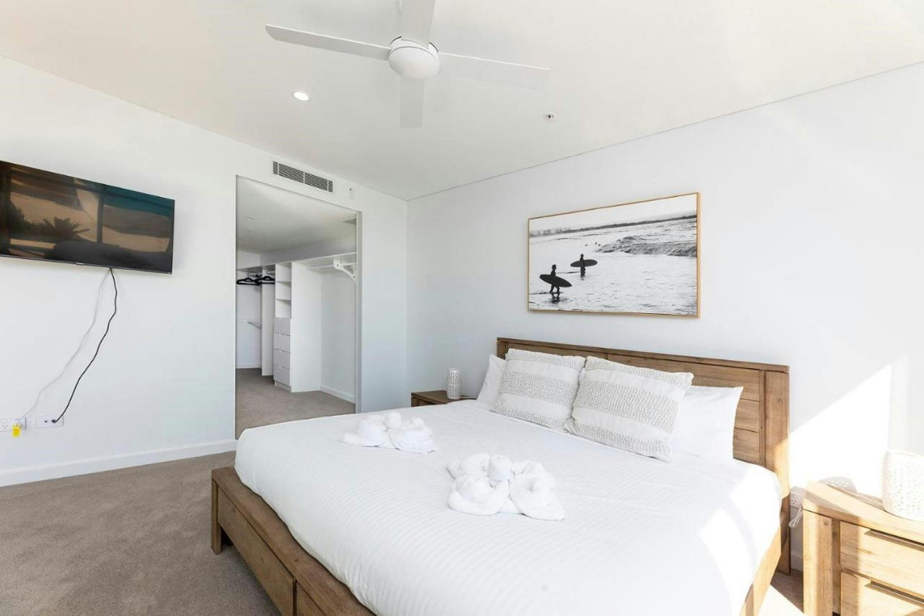 Master bedroom with TV, walk in wardrobe and ensuite