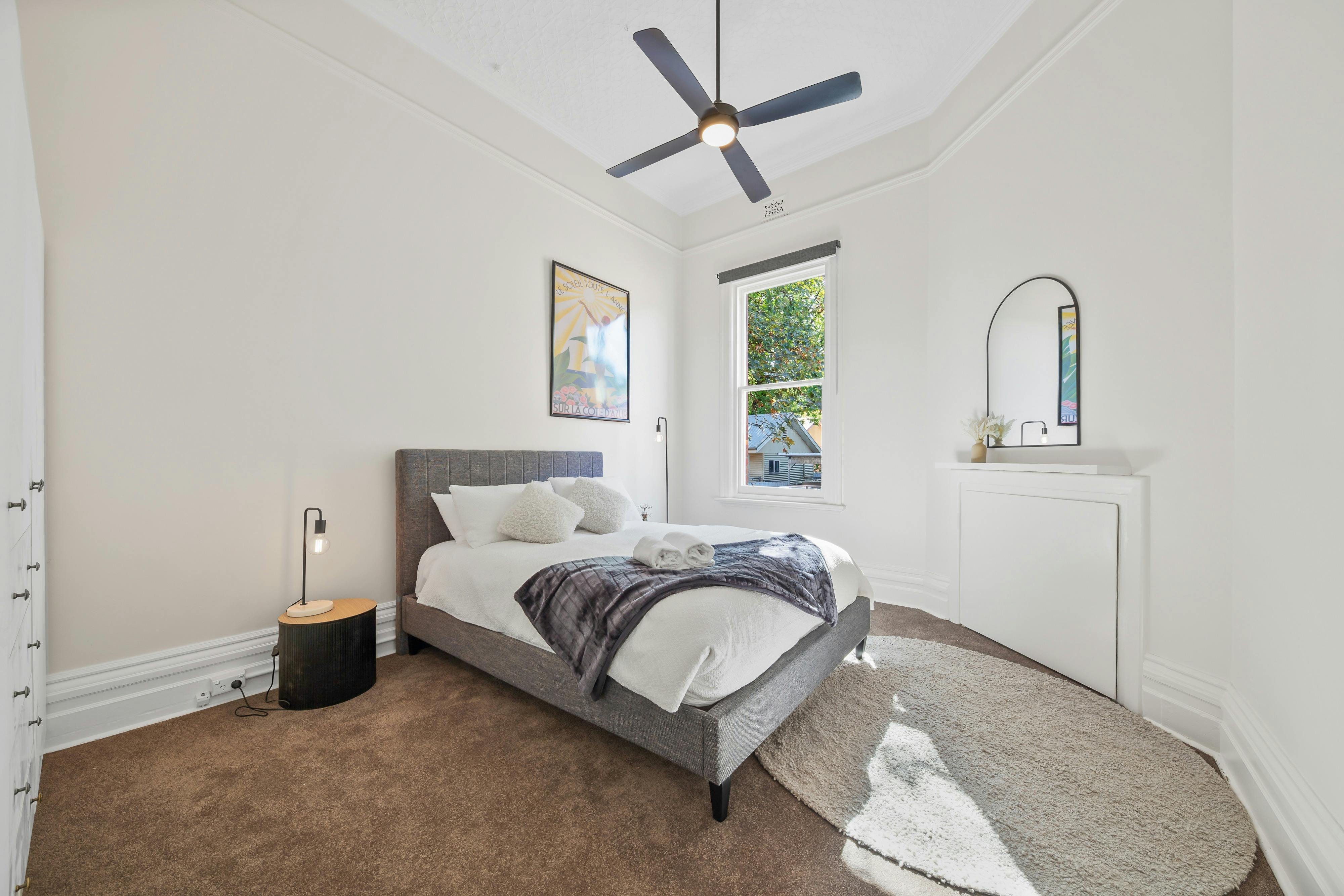 Queen size bed, bedside tables, bedside lamps