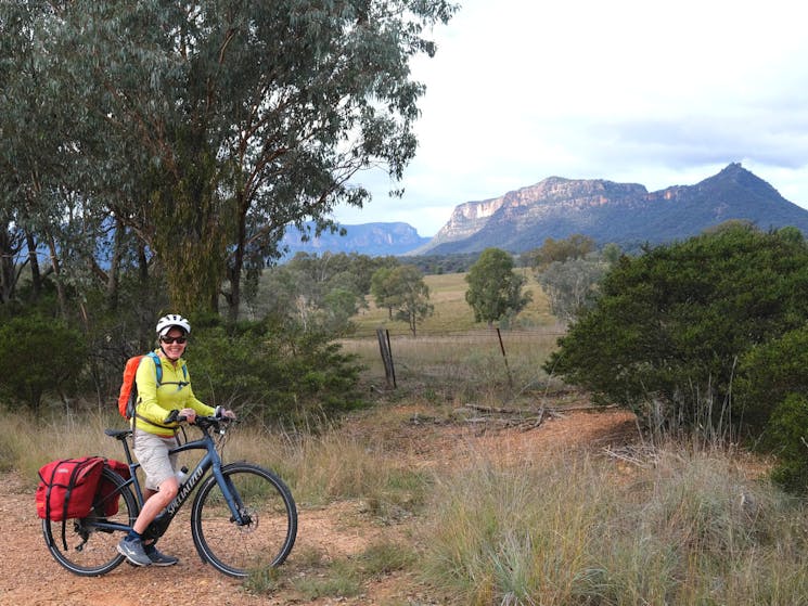 Cyclist at a viewpoint in the Capertee Valley.