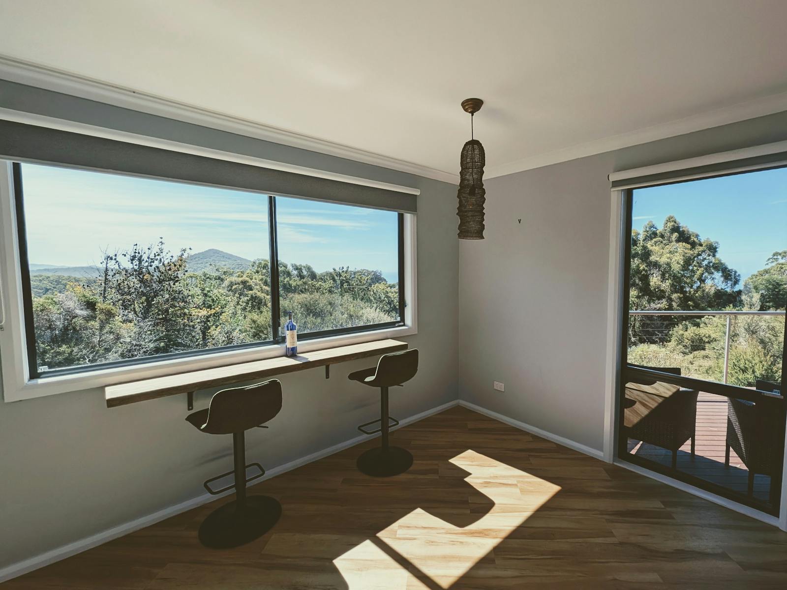 The bar area offers a stunning view, providing the perfect spot to unwind with a drink.