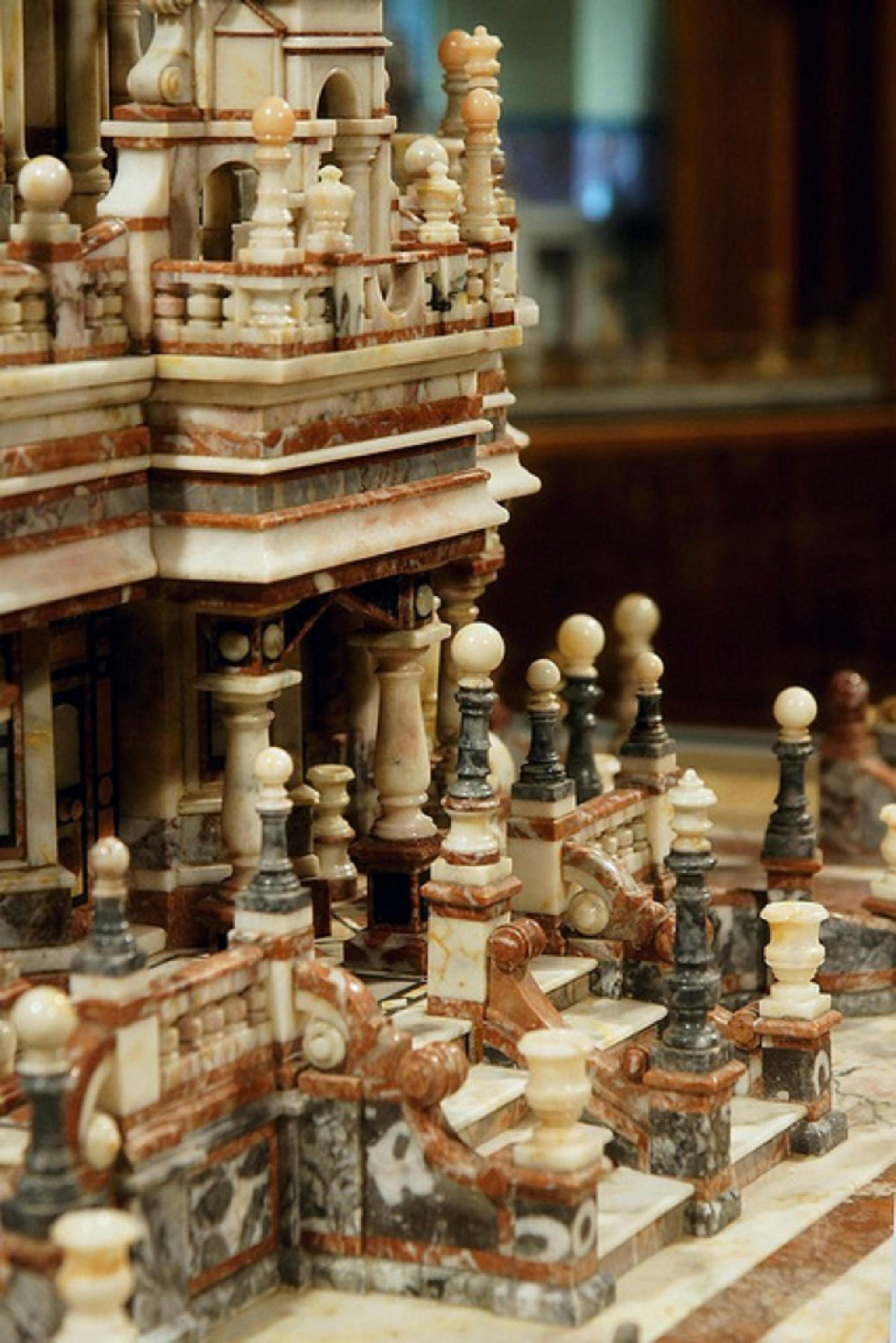 Close-up of marble balconies, columns and details in Frank Rusconi’s Marble Masterpiece.