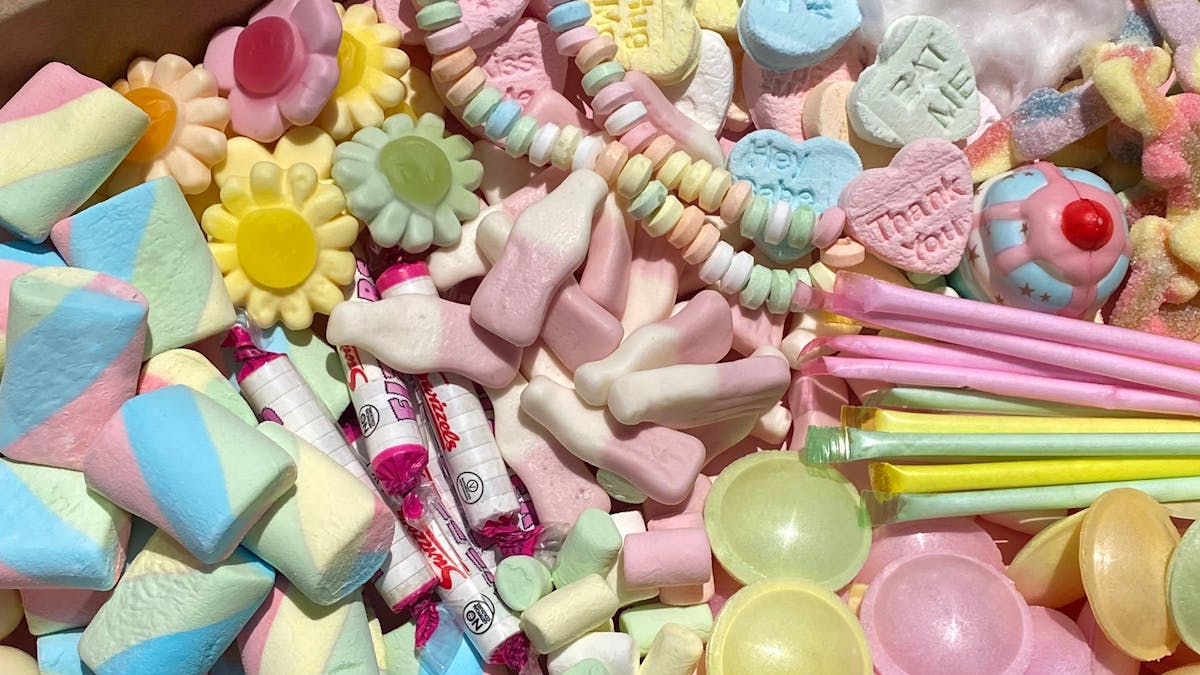 Pastel confectionery platter featuring marshmallows, chocolates and lollies at Sugar Rush Dayboro in