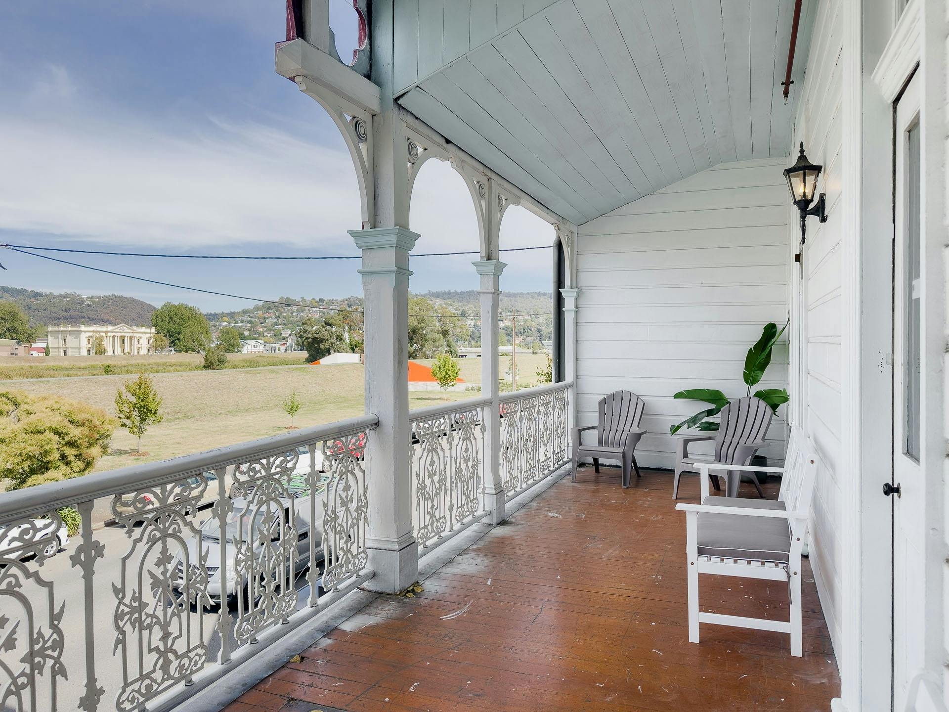 Balcony with seating and view over Launceston