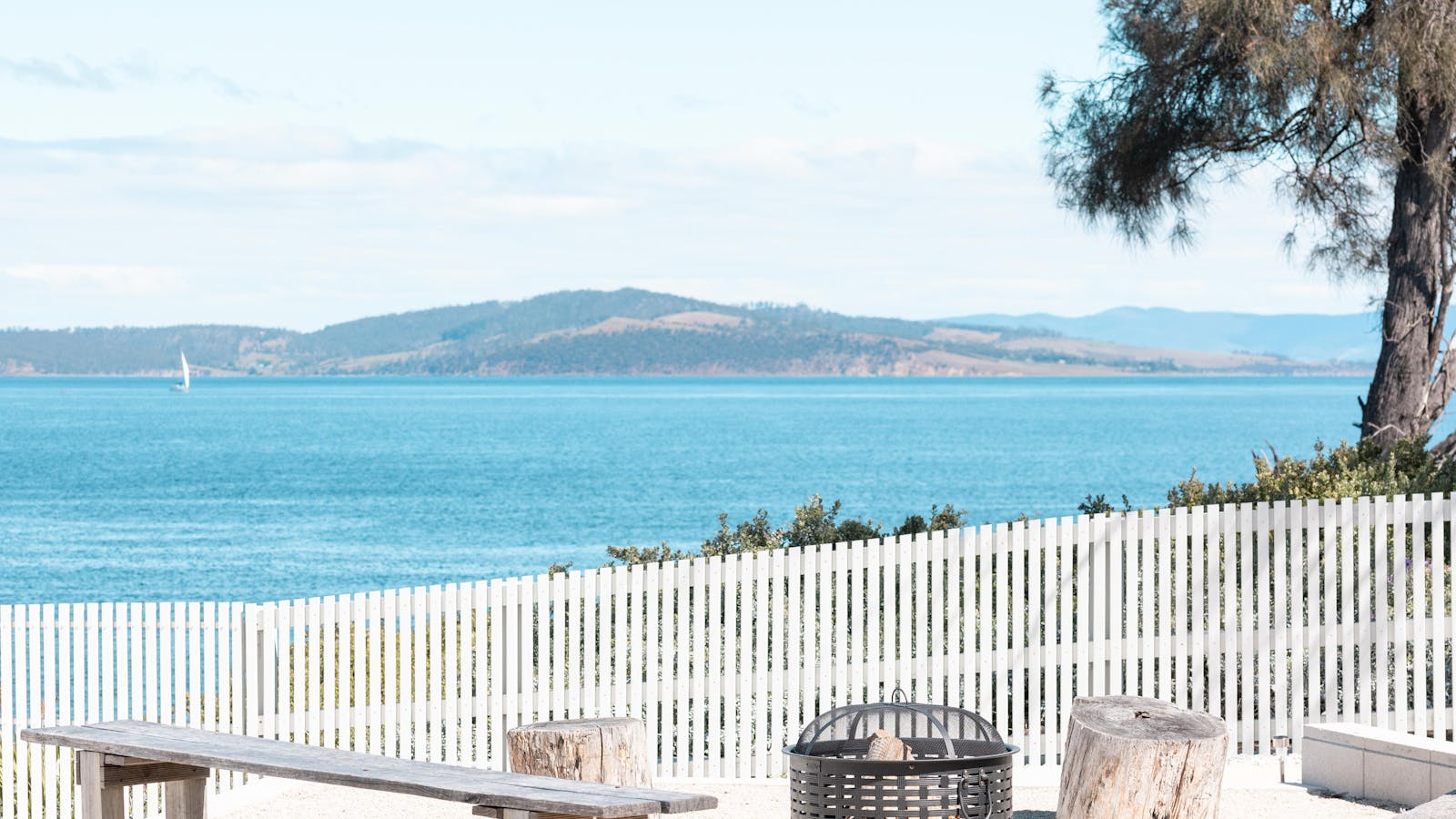 Relax by the fire pit with stunning ocean views and peaceful coastal vibes