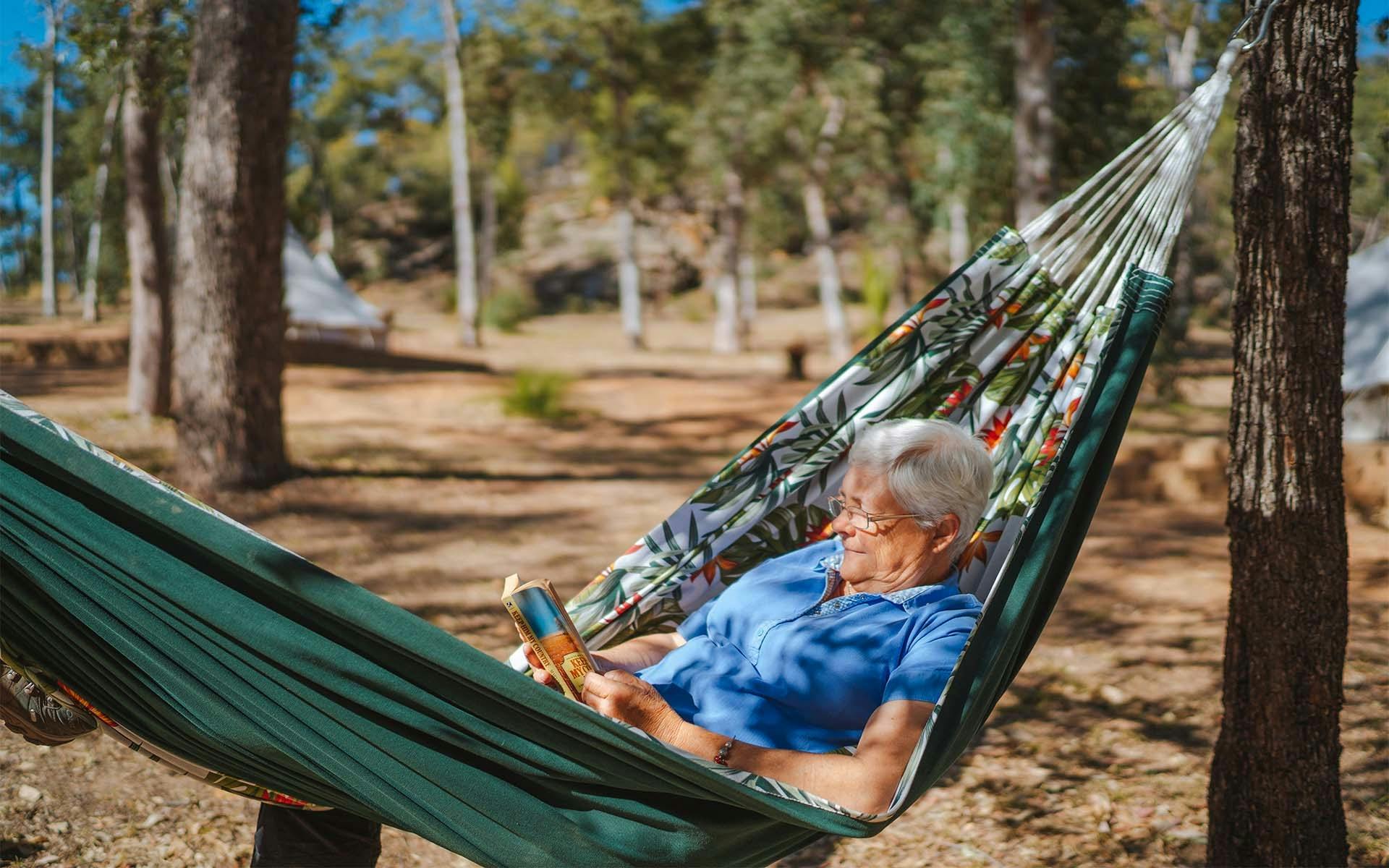 A woman relaxing on a hammock