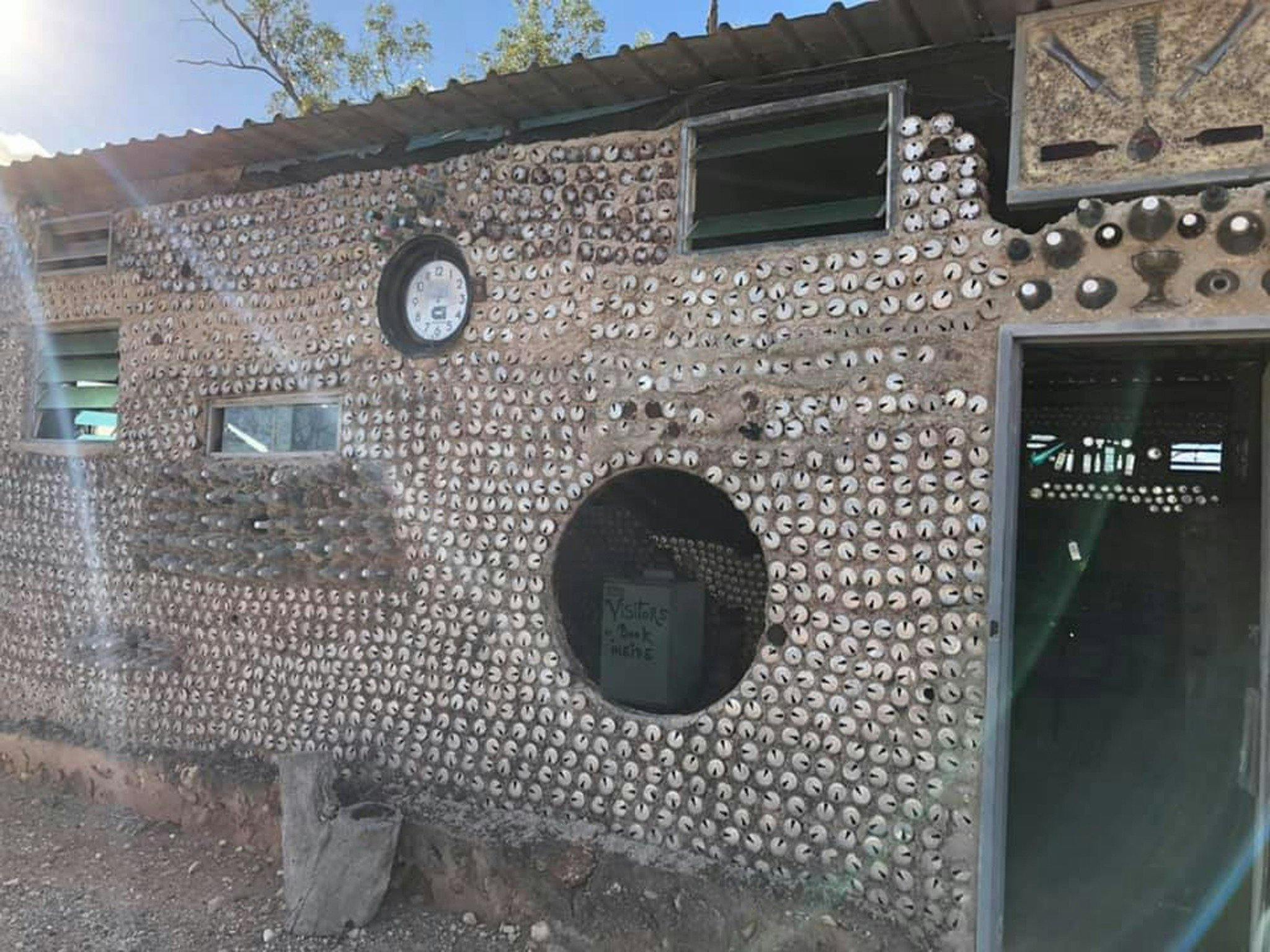 Side view of beer can house
