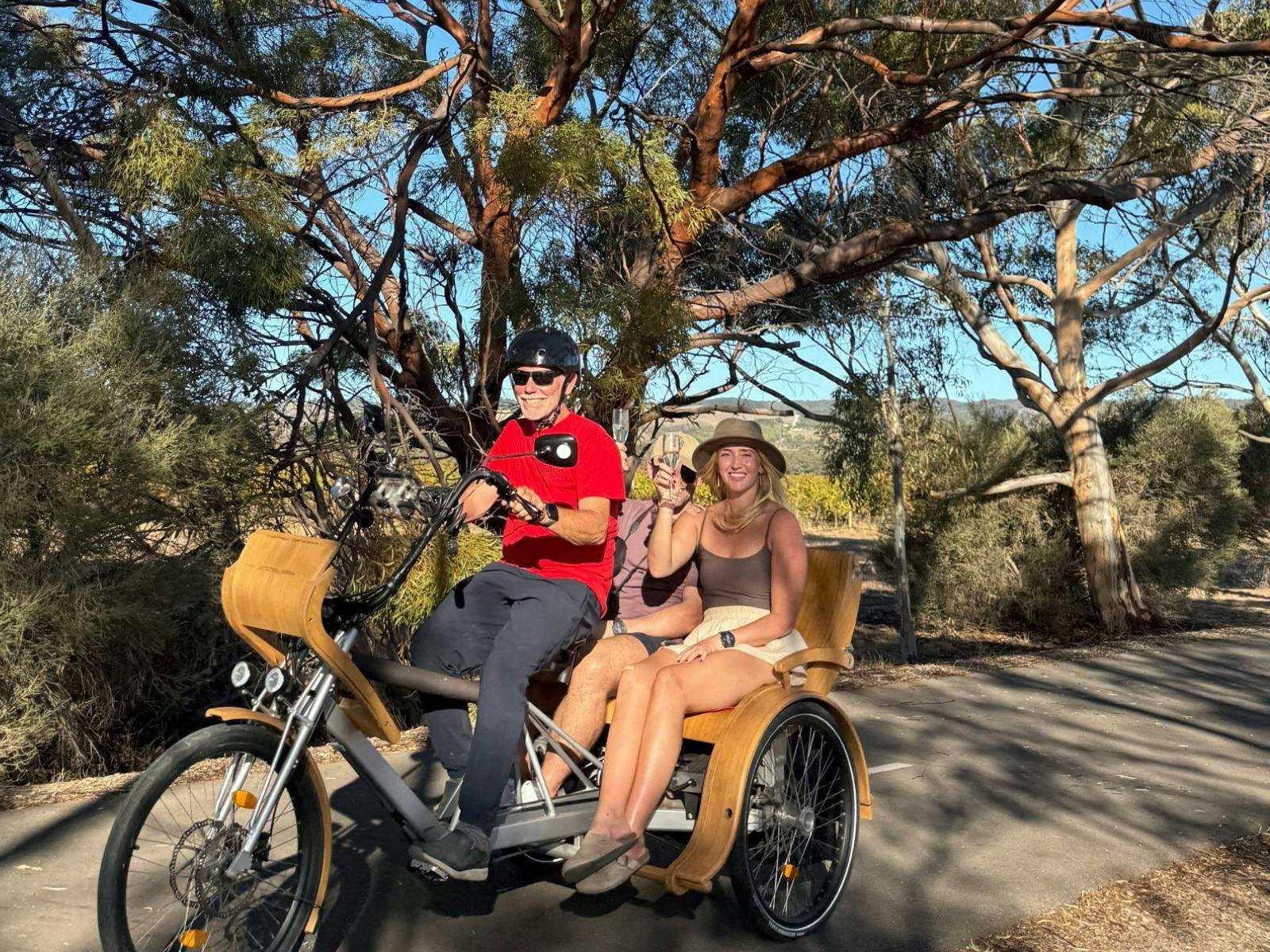 Young couple enjoying a Chauffeured eTukTuk Tour