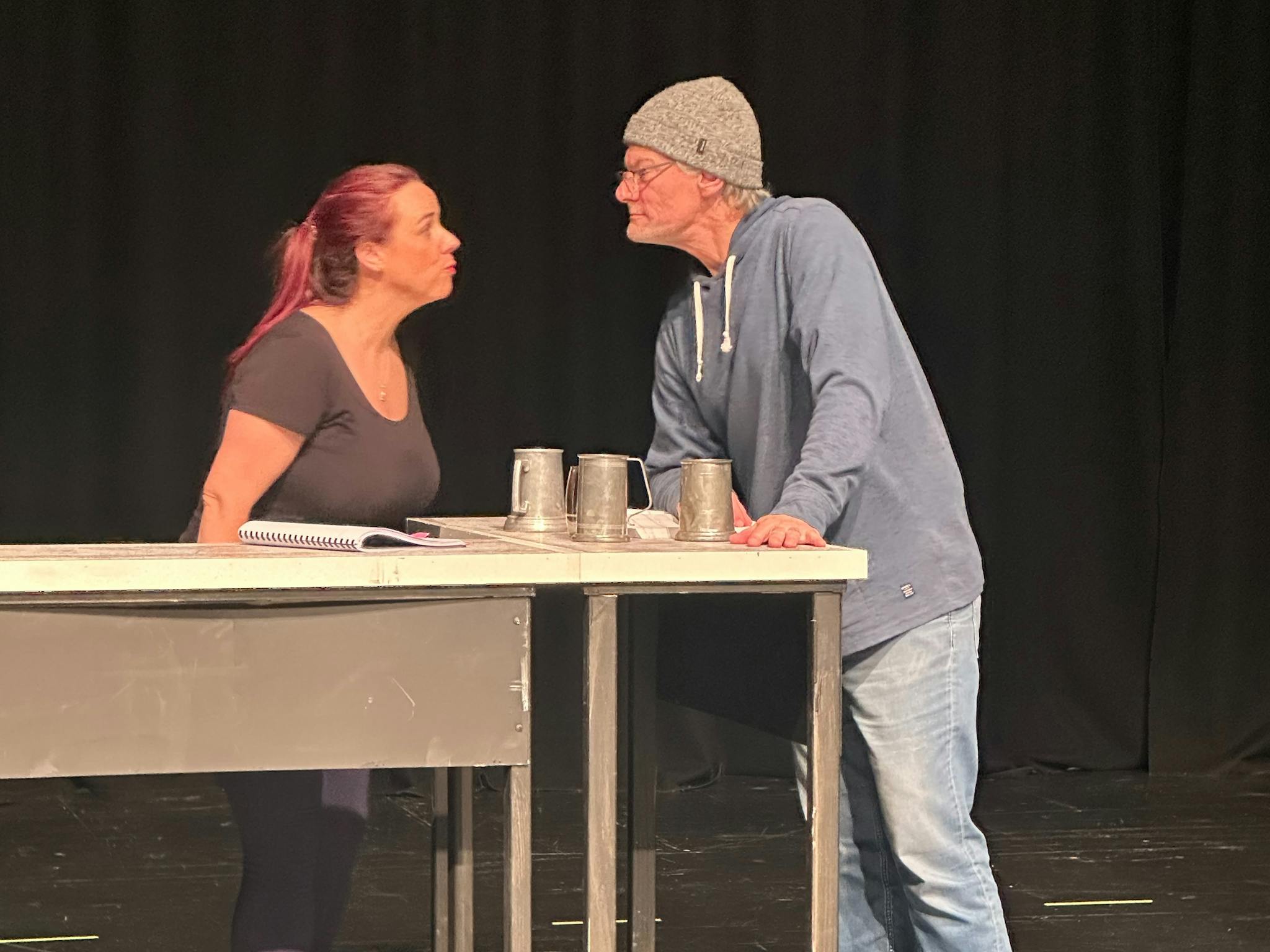 Sweeney Todd and Mrs Lovett in the Pie Shop having an intense discussion