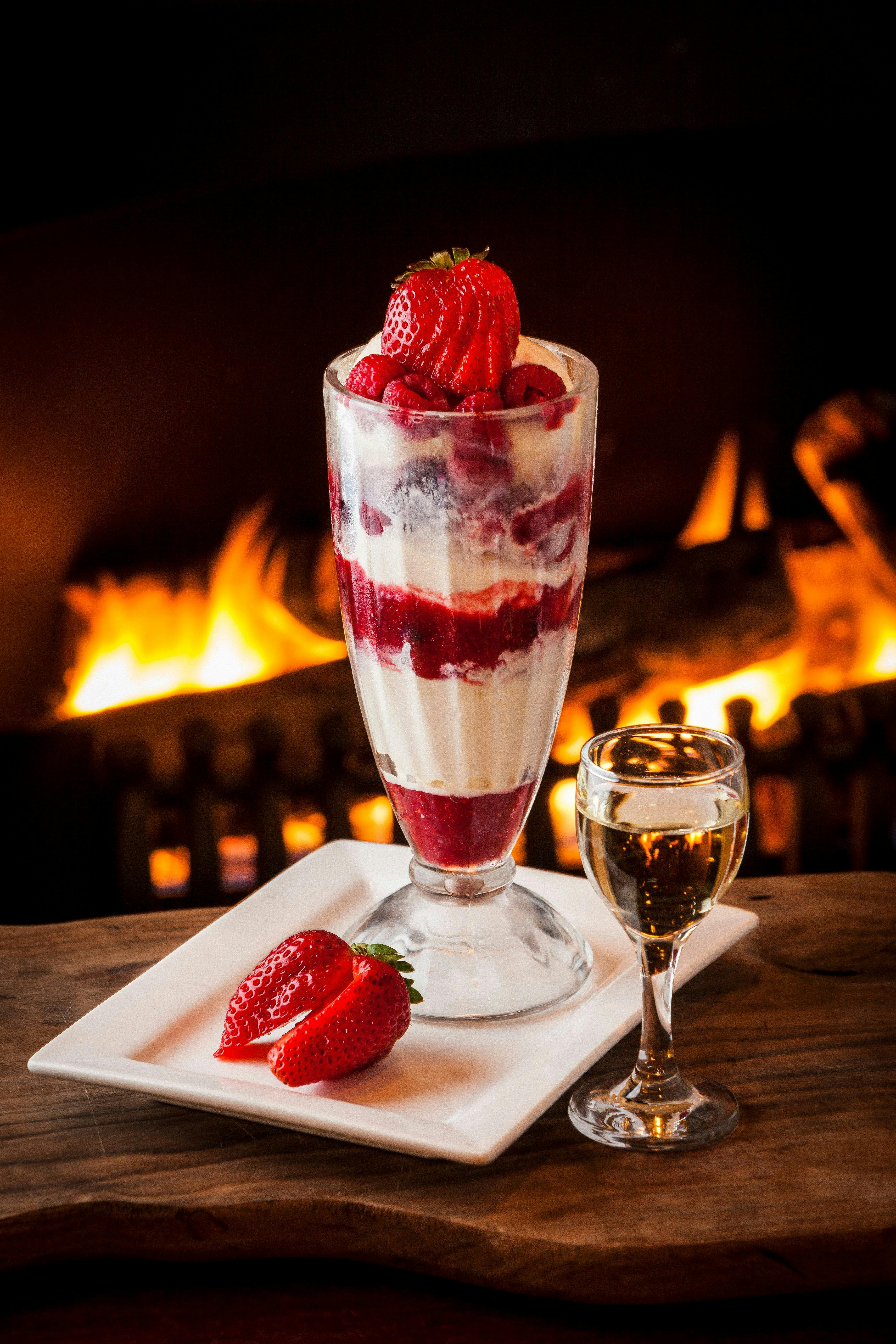 fresh berries and icecream enjoyed by the fire