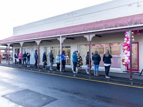 Customers lining up outside the Cake Shop
