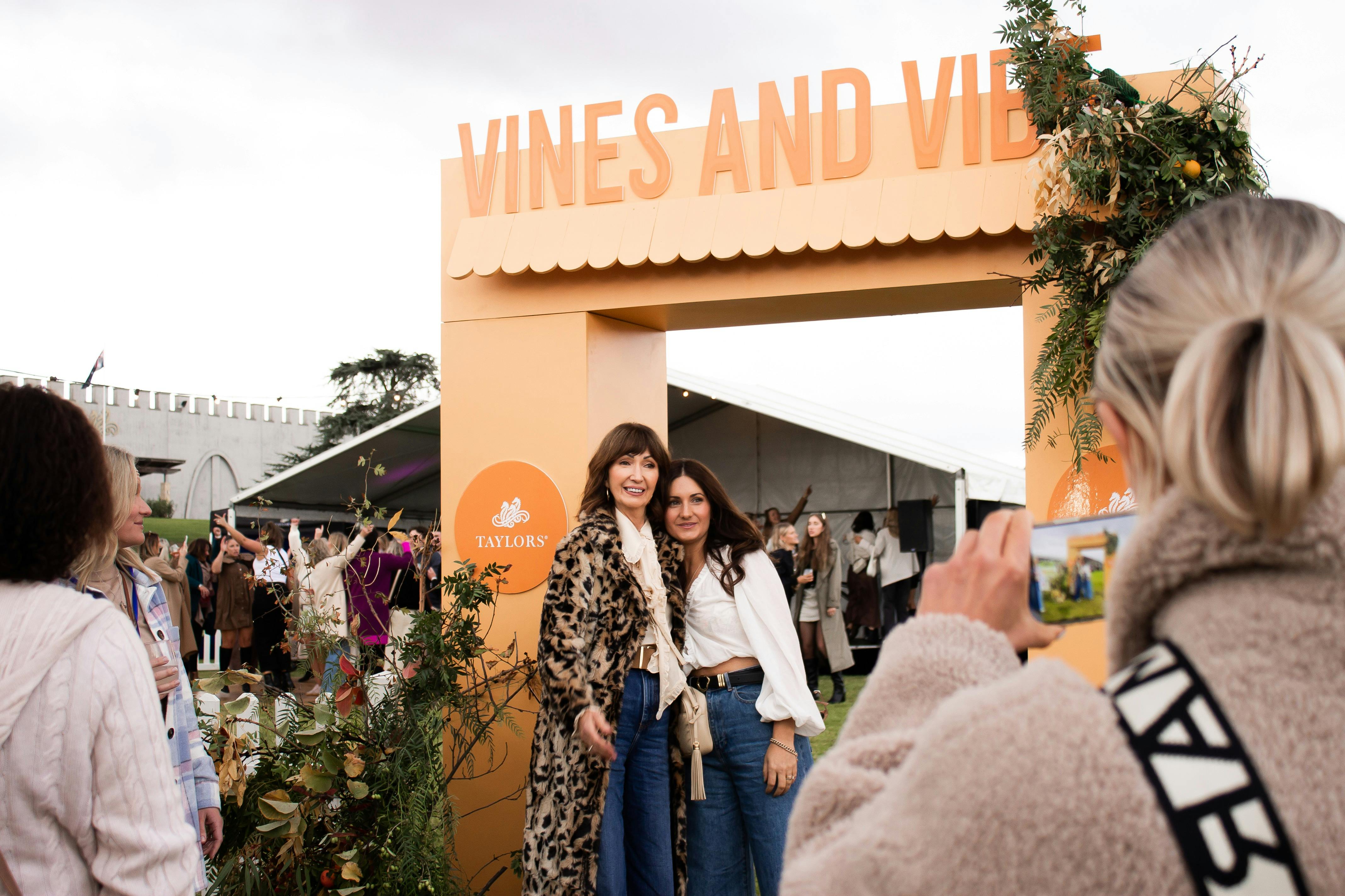 Ladies posing at the entrance of Taylors Gourmet Festival