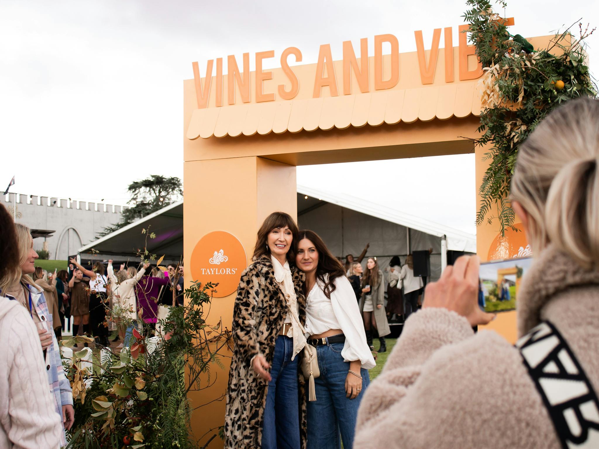 Ladies posing at the entrance of Taylors Gourmet Festival