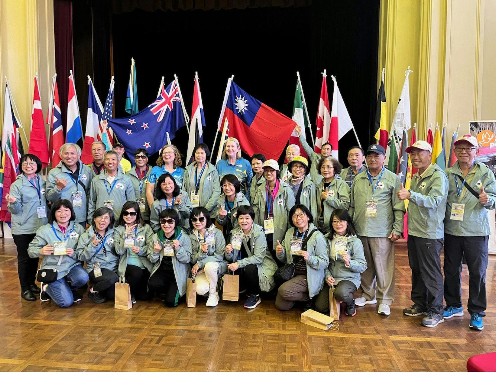 Taiwanese walking team with flags