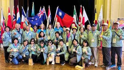 Taiwanese walking team with flags